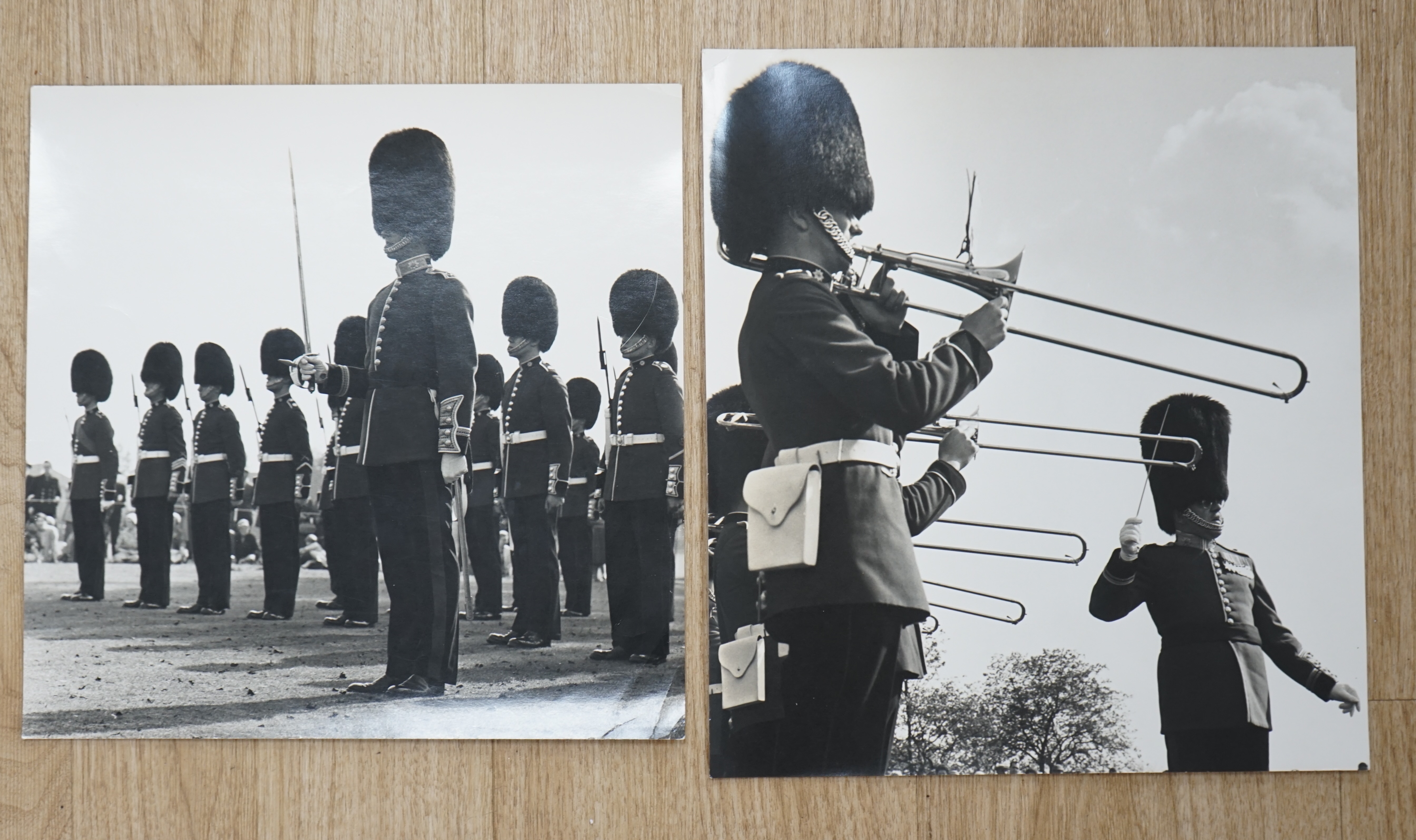Bert Hardy, two black and white photographs, Soldiers wearing military dress, each stamped verso, 31 x 28cm, unframed. Condition - fair